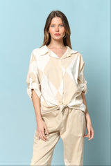 מכופתרת מעויינים