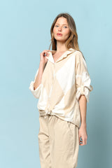 מכופתרת מעויינים