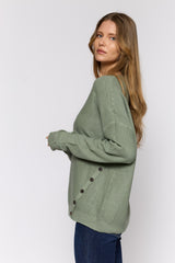 סריג כפתורים בצד