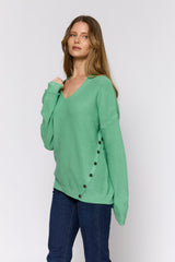 סריג כפתורים בצד