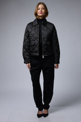 מעיל קווילט מעויין רחב